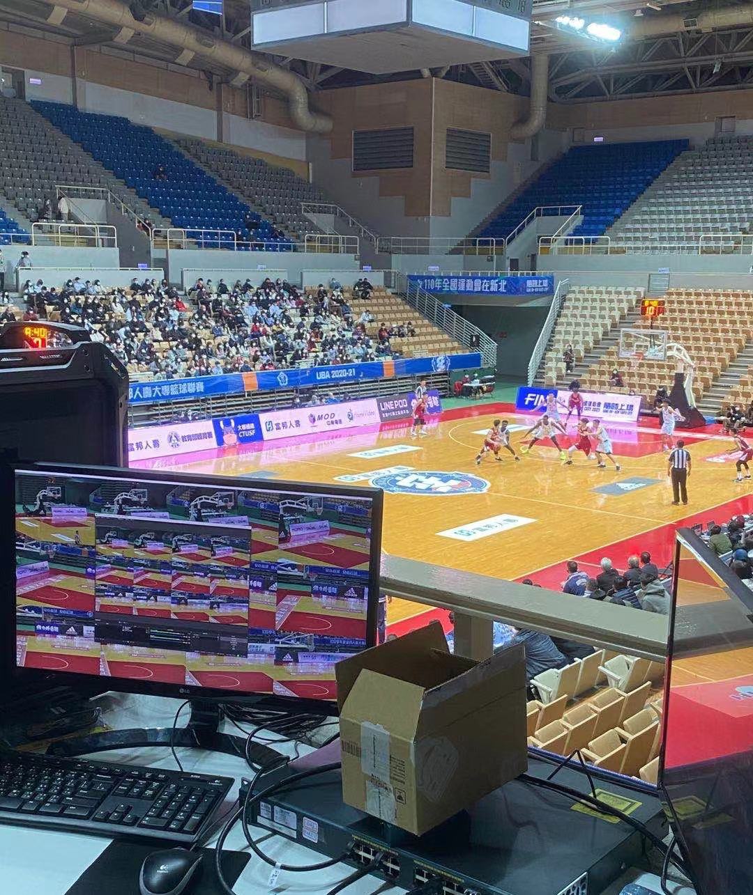 Cameras and equipment overlooking a basketball court during field deployment